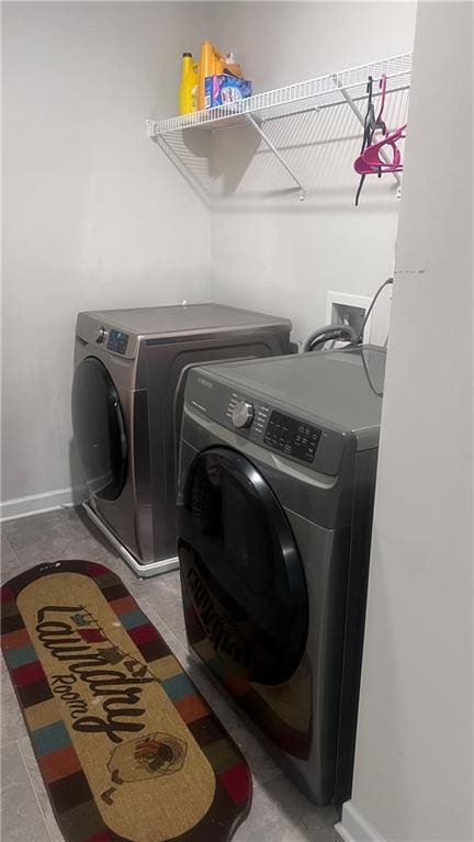 3750 Richmond Bnd, Lithonia, GA 30038 - laundry room featuring washer and dryer and baseboards