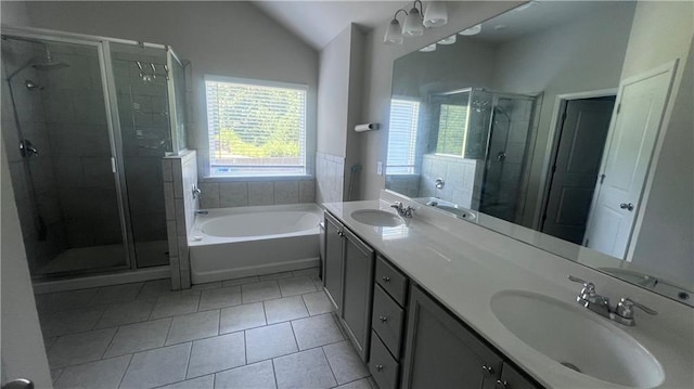 3750 Richmond Bnd, Lithonia, GA 30038 - bathroom with tile patterned floors, a stall shower, a garden tub, double vanity, and lofted ceiling