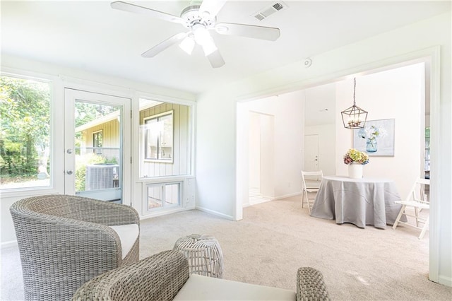 2753 Fireside Ct SE, Marietta, GA 30067 - carpeted living room with baseboards and a ceiling fan