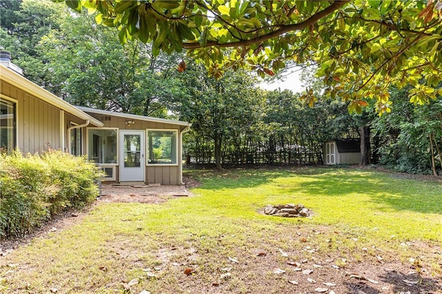 2753 Fireside Ct SE, Marietta, GA 30067 - view of grassy yard featuring a sunroom