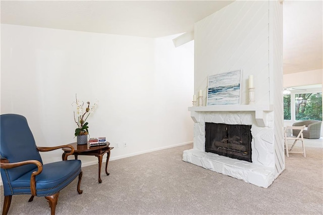 2753 Fireside Ct SE, Marietta, GA 30067 - living area with carpet floors, a stone fireplace, and baseboards