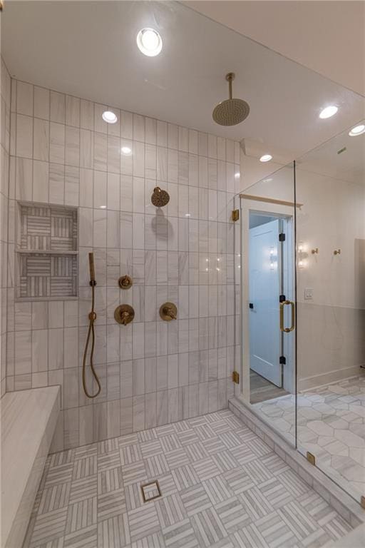 bathroom featuring a stall shower, tile patterned flooring, and recessed lighting