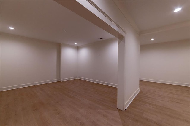 empty room with recessed lighting and wood finished floors