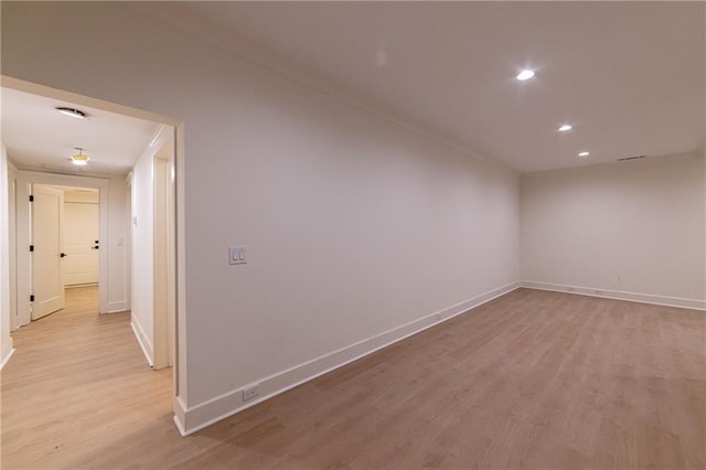 interior space with recessed lighting, light wood-type flooring, and baseboards