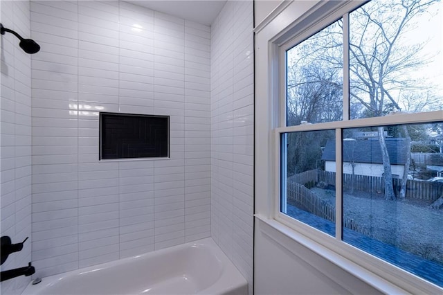 bathroom with shower / tub combination