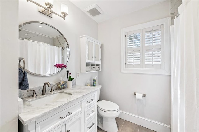 full bathroom featuring toilet, baseboards, visible vents, tile patterned flooring, and vanity