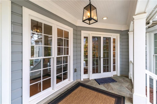 view of exterior entry featuring french doors