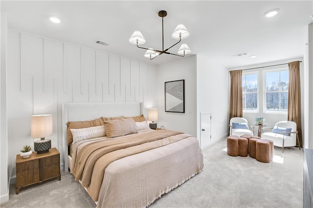 carpeted bedroom featuring an inviting chandelier, recessed lighting, and visible vents