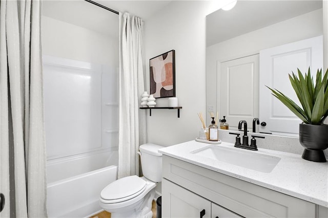 full bathroom featuring vanity, toilet, and shower / bathtub combination with curtain