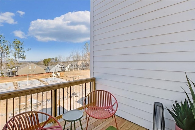 balcony featuring a residential view