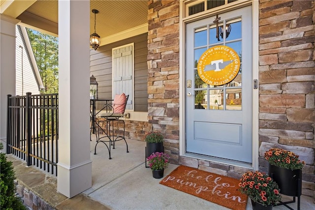 entrance to property with a porch