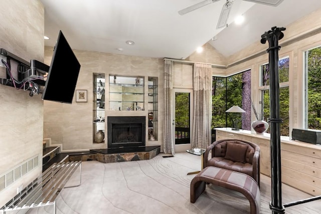 6525 Old Riverside Dr NW, Sandy Springs, GA 30328 - sitting room with a ceiling fan, vaulted ceiling, and exterior fireplace