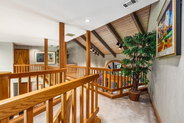 6525 Old Riverside Dr NW, Sandy Springs, GA 30328 - hall featuring visible vents, lofted ceiling with beams, an upstairs landing, and carpet flooring