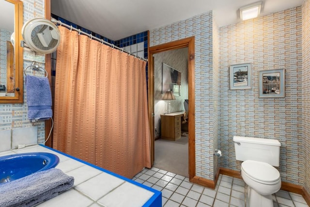6525 Old Riverside Dr NW, Sandy Springs, GA 30328 - bathroom with tile patterned floors and toilet