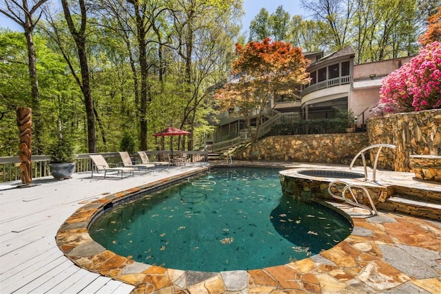 6525 Old Riverside Dr NW, Sandy Springs, GA 30328 - view of pool with a patio area, a wooden deck, and a pool with connected hot tub