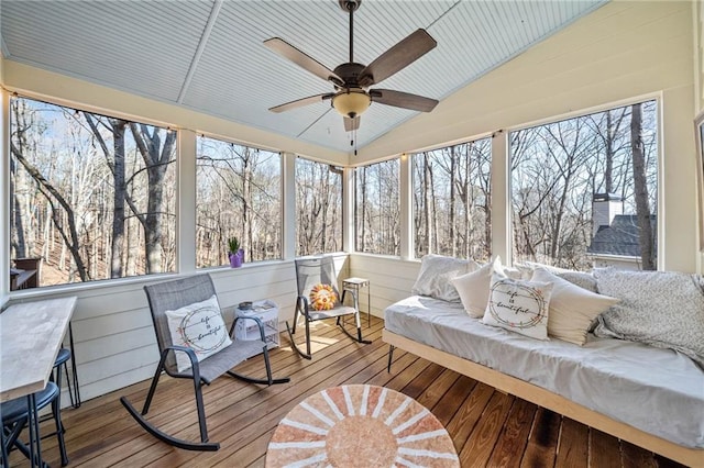 sunroom / solarium with vaulted ceiling and ceiling fan