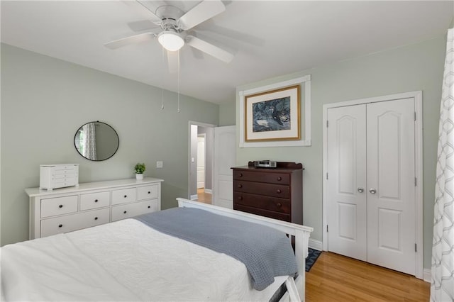 2486 Memorial Dr SE, Atlanta, GA 30317 - bedroom with light wood-type flooring, a closet, and ceiling fan