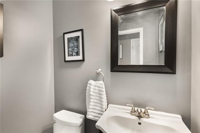2486 Memorial Dr SE, Atlanta, GA 30317 - half bath featuring a sink and toilet