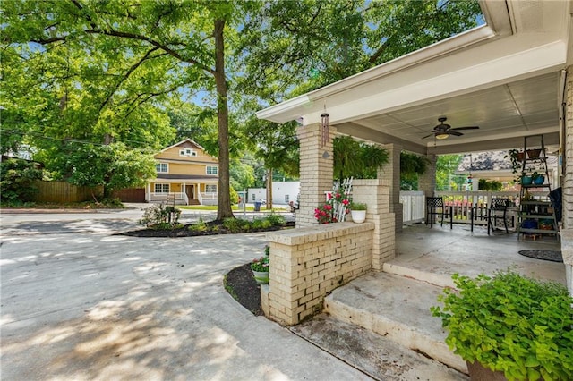 2486 Memorial Dr SE, Atlanta, GA 30317 - view of patio with ceiling fan and fence