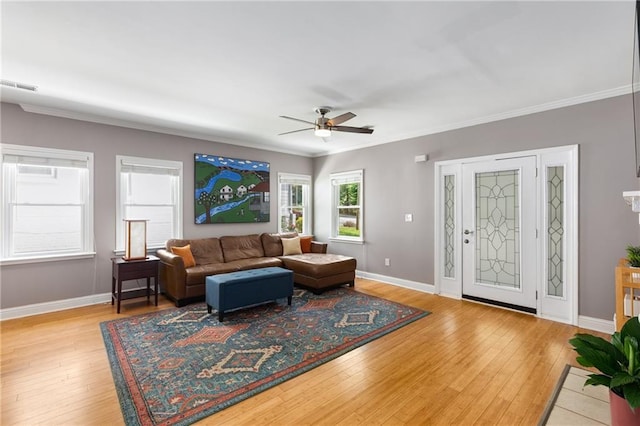 2486 Memorial Dr SE, Atlanta, GA 30317 - living room featuring hardwood / wood-style flooring, crown molding, ceiling fan, and baseboards