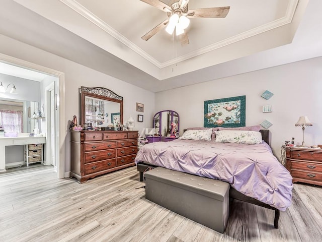 106 Warwick Way SE, Rome, GA 30161 - bedroom featuring a tray ceiling, light wood-style flooring, crown molding, a ceiling fan, and ensuite bathroom