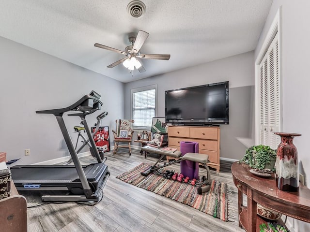 106 Warwick Way SE, Rome, GA 30161 - exercise area with a ceiling fan, wood finished floors, and a textured ceiling