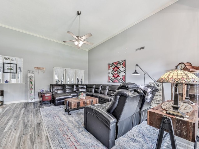 106 Warwick Way SE, Rome, GA 30161 - living room featuring crown molding, a ceiling fan, wood finished floors, and high vaulted ceiling