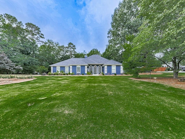 106 Warwick Way SE, Rome, GA 30161 - ranch-style house with a front lawn and a chimney