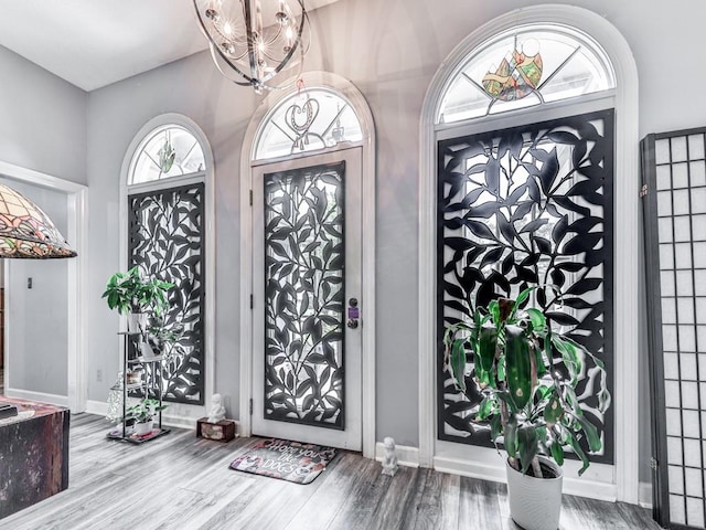 106 Warwick Way SE, Rome, GA 30161 - foyer featuring a chandelier and wood finished floors