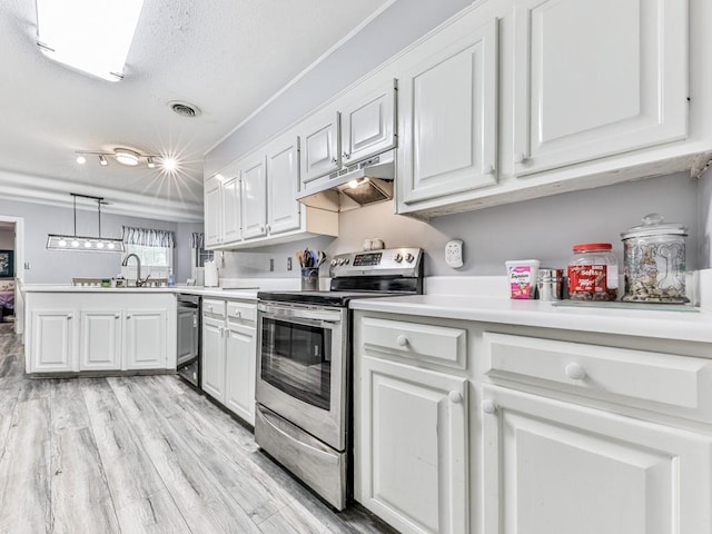106 Warwick Way SE, Rome, GA 30161 - kitchen featuring appliances with stainless steel finishes, under cabinet range hood, a peninsula, white cabinets, and a textured ceiling