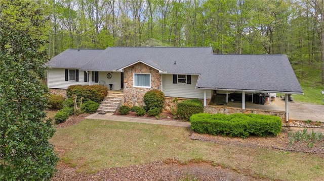 4286 Pool Rd, Winston, GA 30187 - view of front of property with stone siding, stairs, a front yard, roof with shingles, and a carport