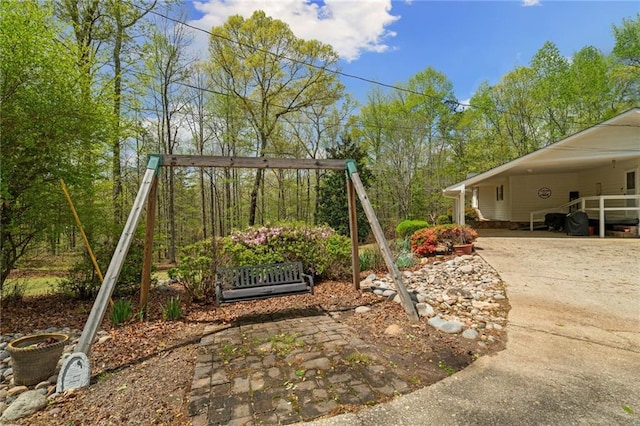 4286 Pool Rd, Winston, GA 30187 - view of yard with concrete driveway and a carport