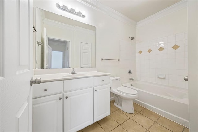 full bathroom with tile patterned flooring, vanity, ornamental molding, tiled shower / bath, and toilet