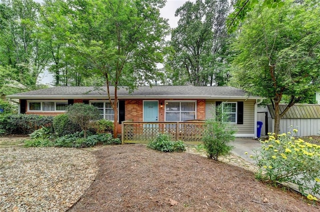 ranch-style home with brick siding