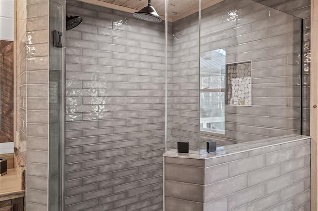 full bathroom with a tile shower