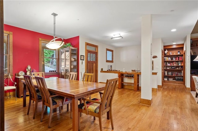 dining room with light hardwood / wood-style flooring