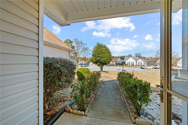 view of yard featuring a residential view