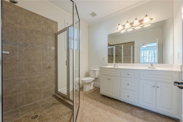 bathroom with a shower with shower door, tile patterned flooring, vanity, toilet, and crown molding