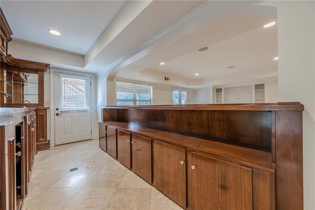 bar featuring a tray ceiling