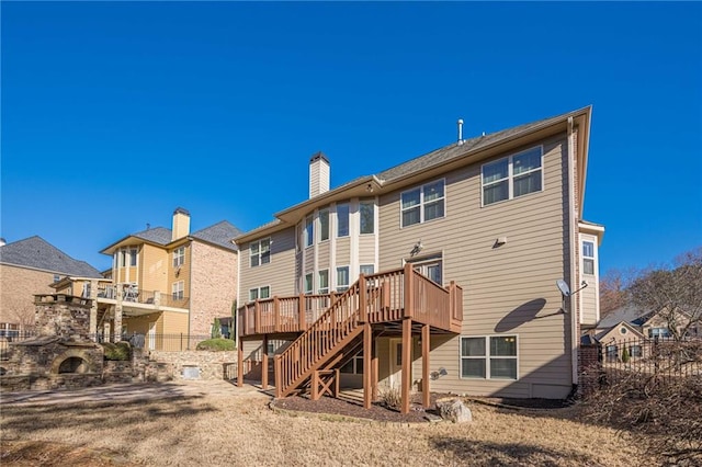 rear view of house with a deck