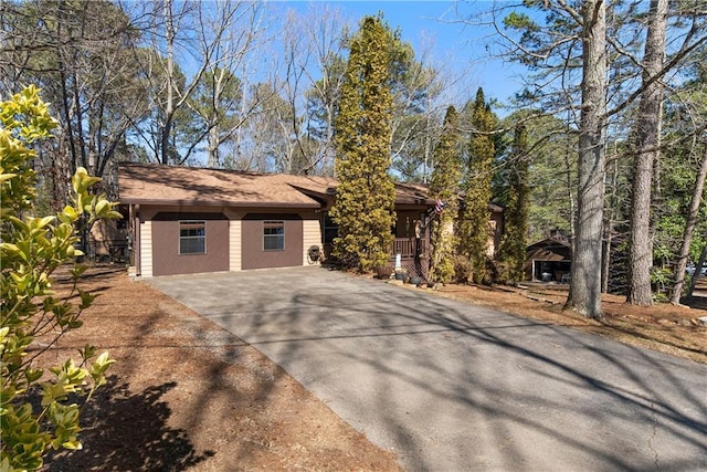 garage featuring driveway