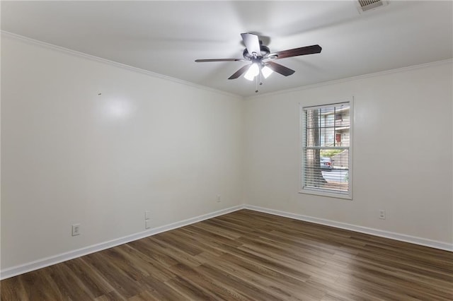 602 Country Park Dr SE, Smyrna, GA 30080 - spare room with dark wood-style floors, ornamental molding, baseboards, and ceiling fan