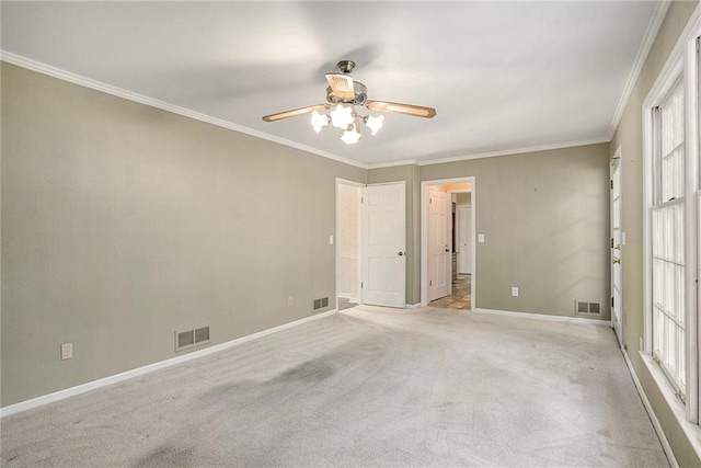 1703 W Nancy Creek Dr NE, Brookhaven, GA 30319 - spare room featuring baseboards, a ceiling fan, ornamental molding, and light colored carpet