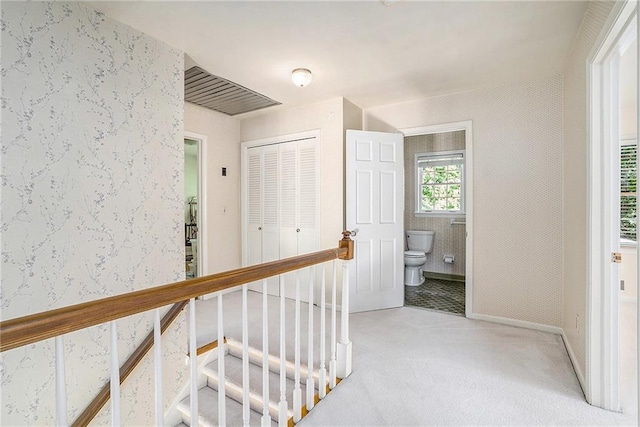 1703 W Nancy Creek Dr NE, Brookhaven, GA 30319 - corridor featuring an upstairs landing, carpet flooring, wallpapered walls, and baseboards