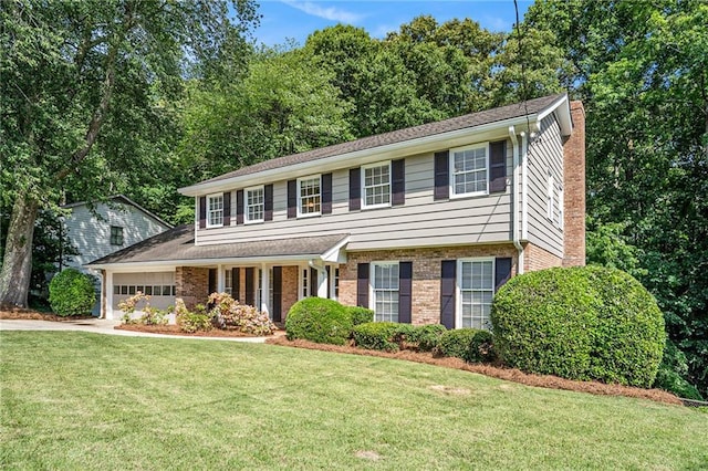 1703 W Nancy Creek Dr NE, Brookhaven, GA 30319 - view of front of home featuring a garage, a chimney, brick siding, concrete driveway, and a front yard