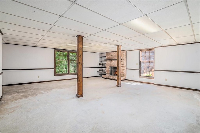 1703 W Nancy Creek Dr NE, Brookhaven, GA 30319 - below grade area with a fireplace, a paneled ceiling, and baseboards