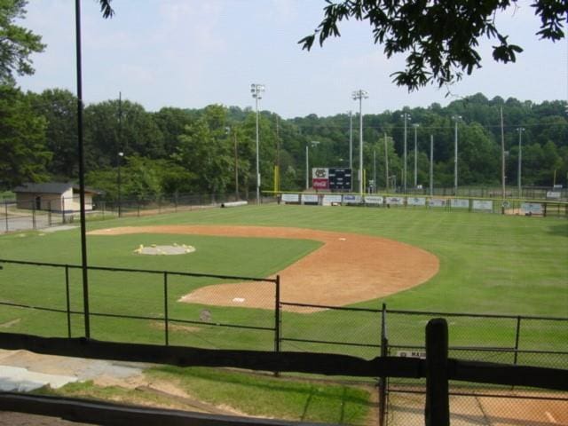 1703 W Nancy Creek Dr NE, Brookhaven, GA 30319 - view of property's community with a wooded view