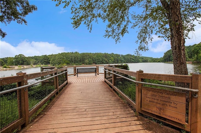 1703 W Nancy Creek Dr NE, Brookhaven, GA 30319 - dock featuring a view of trees and a water view