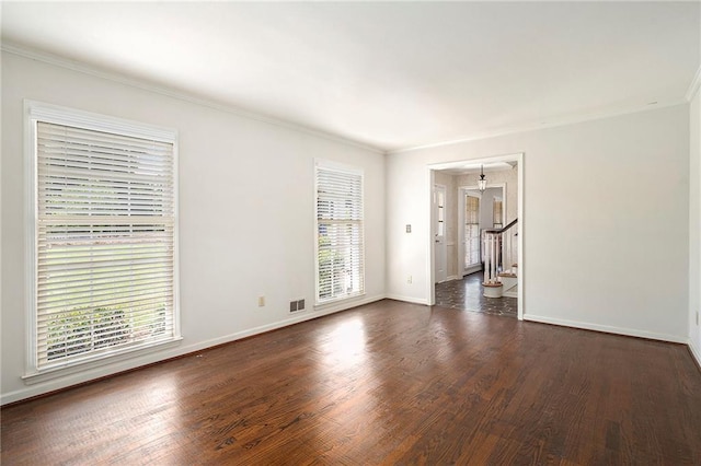 1703 W Nancy Creek Dr NE, Brookhaven, GA 30319 - empty room with dark wood-style floors, ornamental molding, baseboards, and stairs
