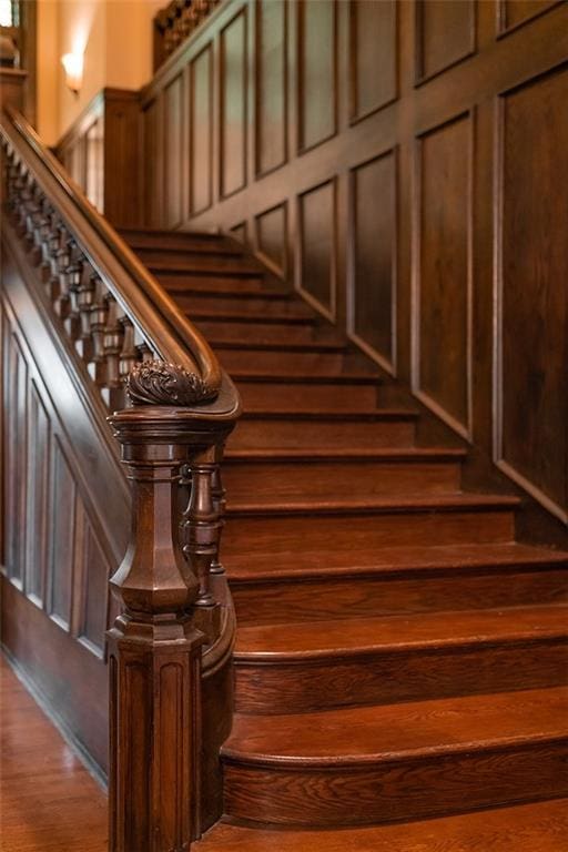 staircase featuring wood finished floors